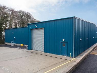 Each and every one of these are bespoke designed. The framework is section steel with steel sheet roof and wall cladding available up to 120mm gauge to meet latest UK Part L-2 Building regulations. Our permanent ‘HYBRID’ buildings are supplied brand new steel-building-380